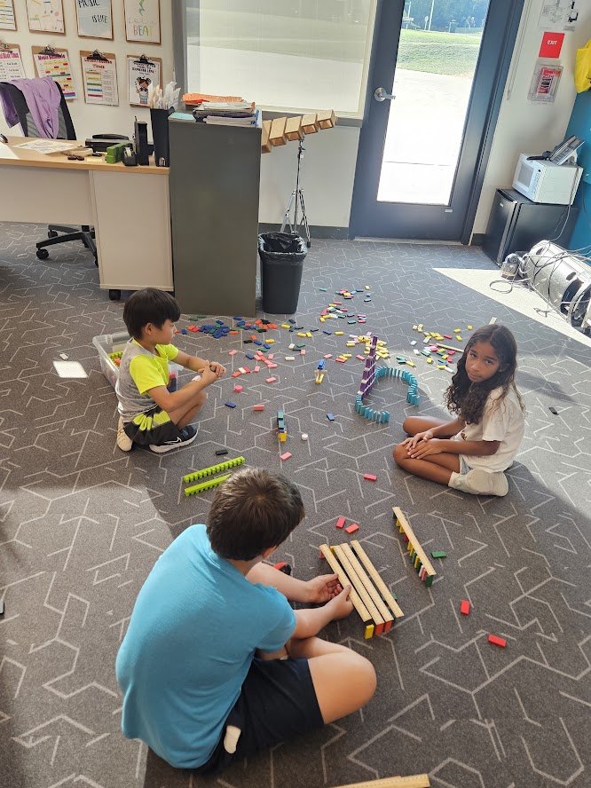 Children building with colored blocks